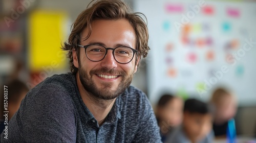 A cheerful teacher seated and teaching with a whiteboard behind them, colorful markers and students blurred in the background  photo