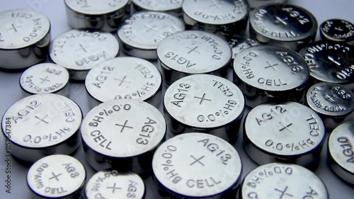 a batch of small round lithium batteries photo