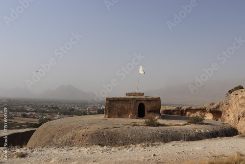 The magnificent ancient temple of Takht-e-Rostam, dramatically framed by a cave entrance, serves as a powerful reminder of Afghanistan's long and illustrious past photo