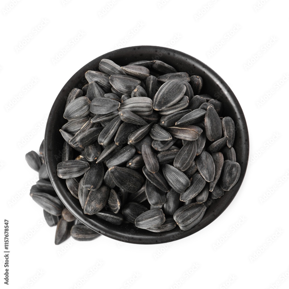 Sunflower seeds in bowl isolated on white, top view Sunflower seeds in bowl isolated on white, top view