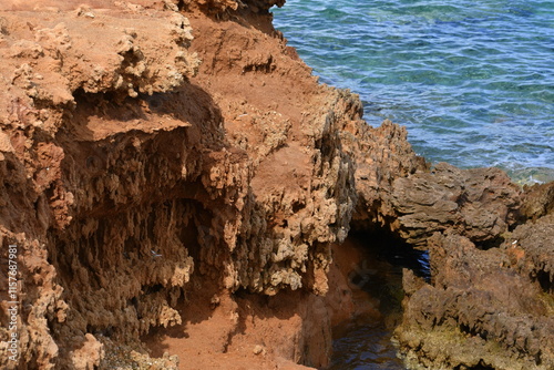 Red Cliffs of Vir Island, blue and turquoise of the Adriatic Sea, Dalmatia, Croatia, Europe,   photo