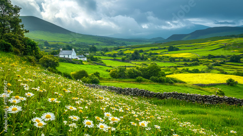 View of countryside with green hills with houses among flowering fields, watercolor St. Patrick's Day card photo