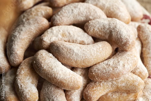 Homemade Christmas cookies called Kipferl or vanilla crescents, closeup photo