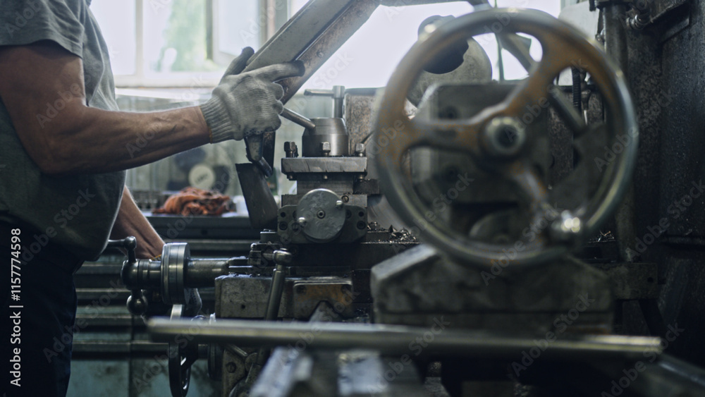 Close up of a metalworker operating a lathe machine, shaping metal components with precision and expertise in a bustling workshop environment Close up of a metalworker operating a lathe machine, shaping metal components with precision and expertise in a bustling workshop environment