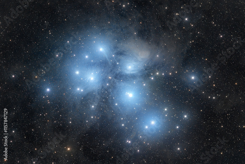 Pleiades, M45. A bright open star cluster surrounded by reflection nebulosity in the Taurus constellation. High quality photo