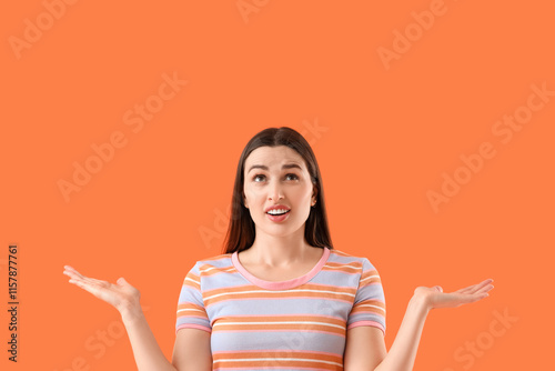 Wondering young woman on or...