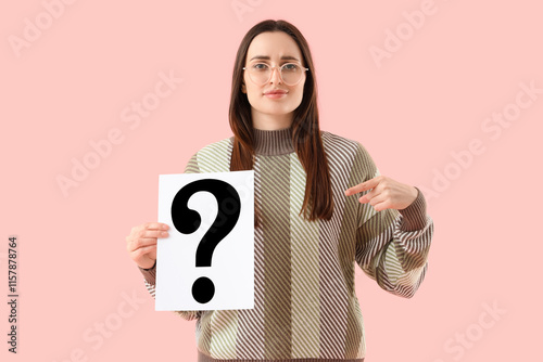 Young woman pointing at pap...