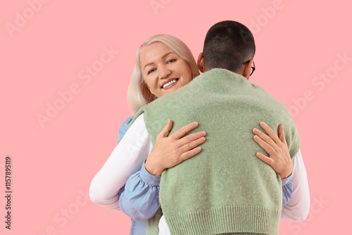 Young man with his mother h...