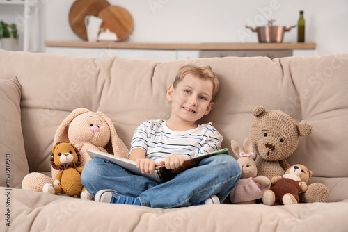 Cute little boy with knitte...