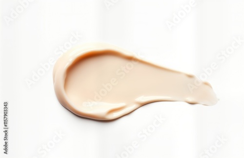 Creamy cosmetic product smear on white background. Cosmetic product texture, application example. Creamy product isolated, ready for presentation. Skin care product appears smooth, light. Perfect for photo