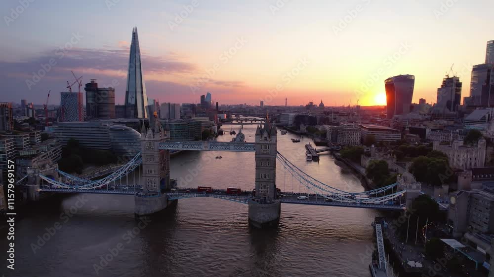 LONDON - 7.11.2024 - Very good aerial footage circling clockwise around London Bridge and the Shard at sunset.
