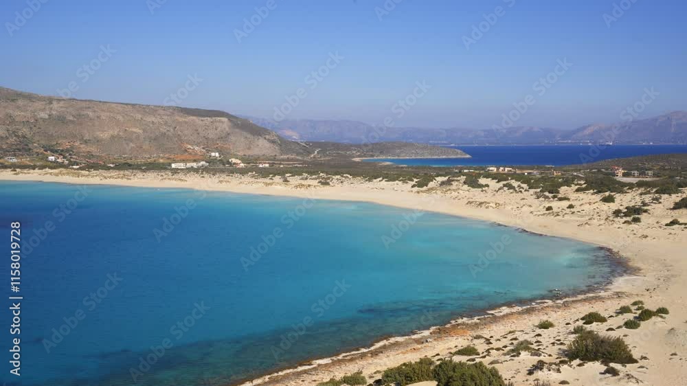 Simos beach with turquoise water in Elafonisos island, Greece Simos beach with turquoise water in Elafonisos island, Greece