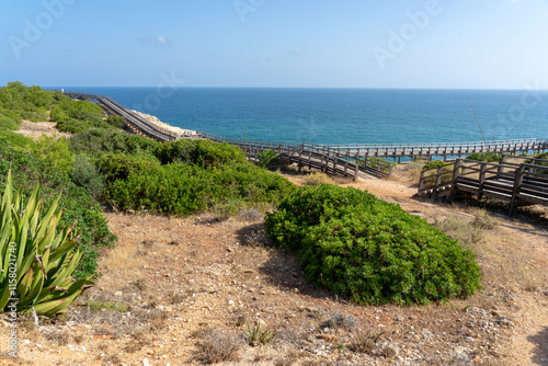 Pada walkways walk around the doll s cave in dry algar in carvoeiro, Algarve. photo