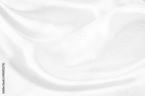White gray satin texture that is white silver fabric silk background with beautiful soft blur pattern natural.