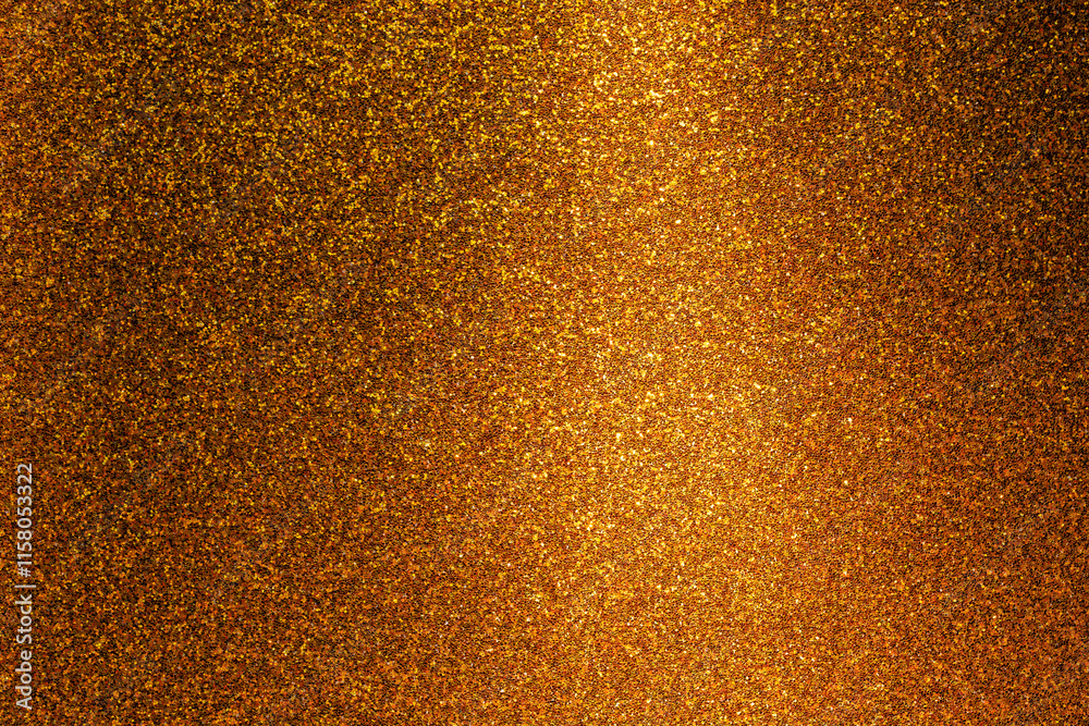 A gold background with a lot of small gold specks A gold background with a lot of small gold specks