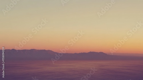 Serene Sunset Over Misty Mountains: A Breathtaking Panorama