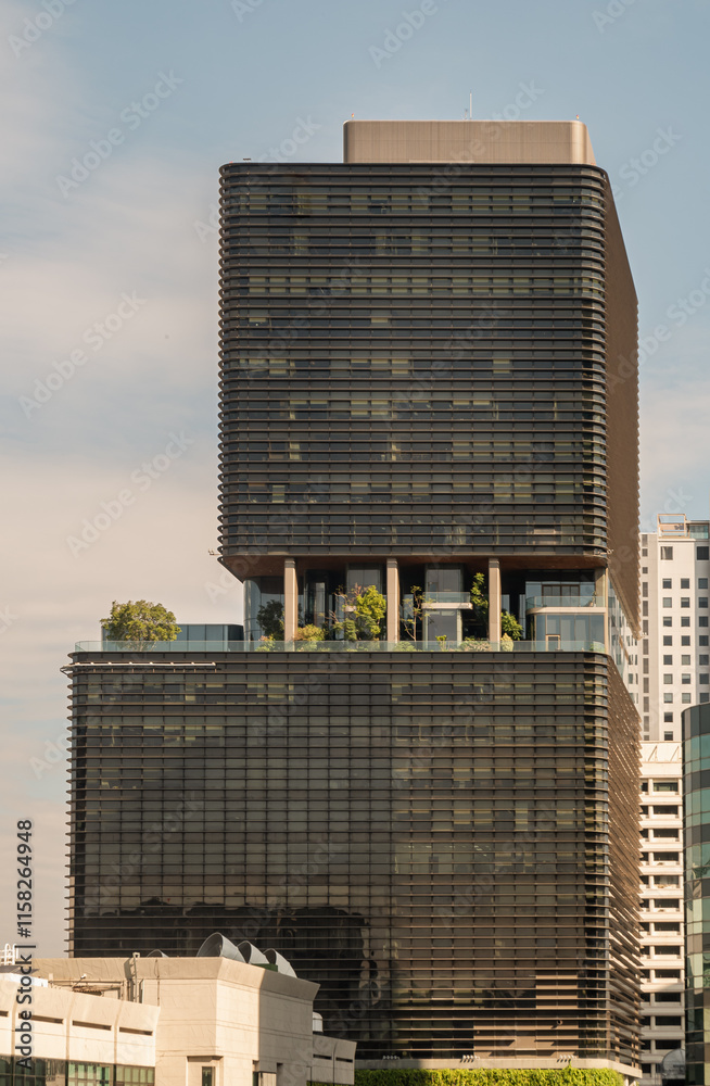 Modern architecture building of Gaysorn Tower with Sky in the background. use it as your Wallpaper, Poster and Space for text, Selective focus.