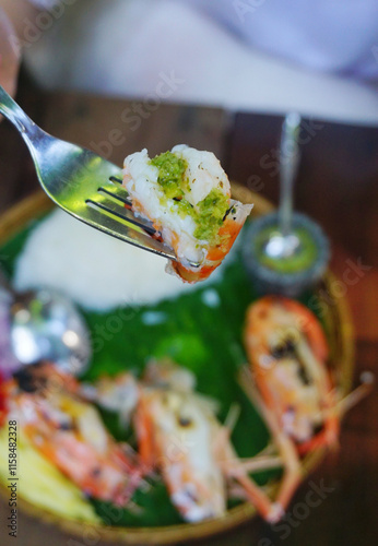 Close up shot of Grilled shrimps with rice and seafood spicy sauce, Thai food traditional style