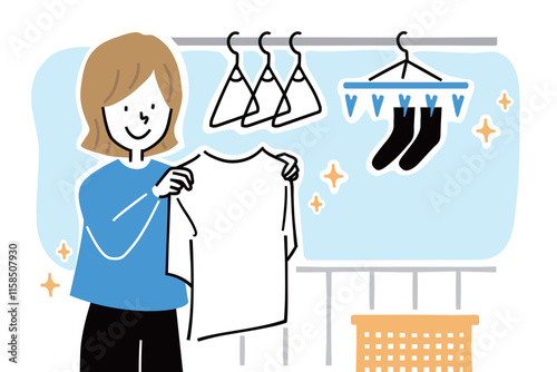 ベランダで洗濯物を干す女性のイラスト