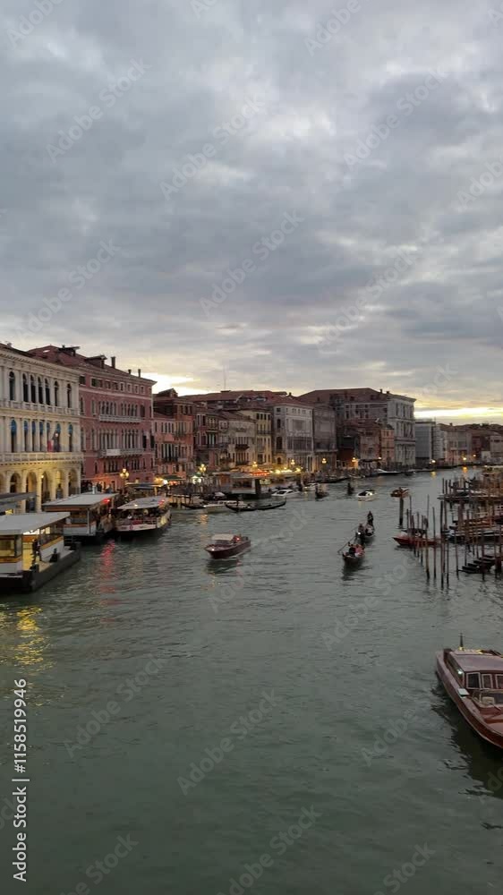 many typical boats on the streets of Venice at sunset many typical boats on the streets of Venice at sunset