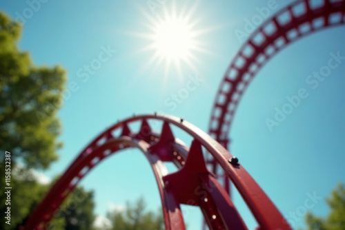 Close-up of a rollercoaster track sharply curving against a clear blue sky, capturing the excitement and thrill of amusement park rides. Dynamic and adventurous theme park concept. photo