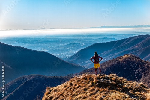 Trekking scene on Lake Como Alps in winter photo