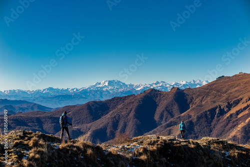 Trekking scene on Lake Como Alps in winter photo