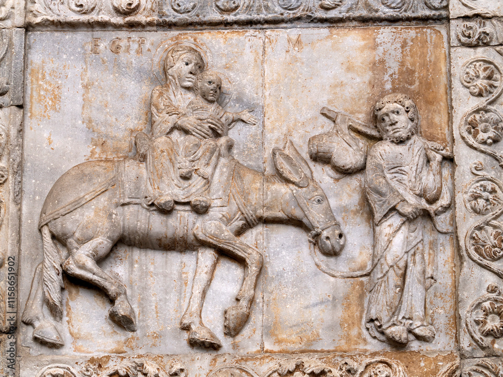 San Zeno Basilica Church in Verona Italy, detail of exterior sculptures and bas relief San Zeno Basilica Church in Verona Italy, detail of exterior sculptures and bas relief