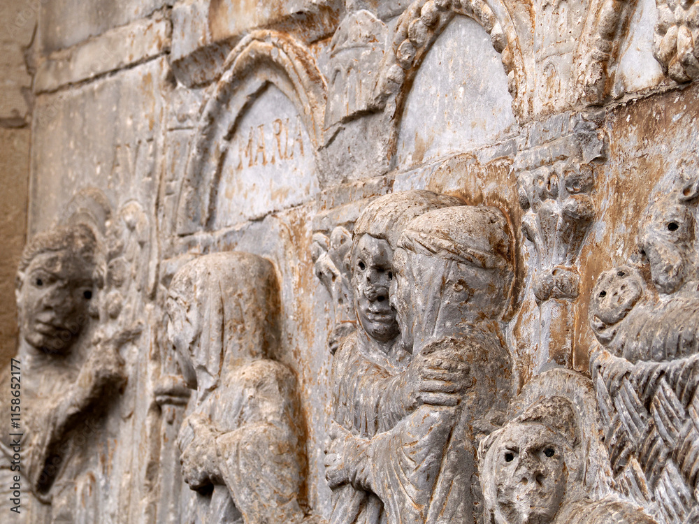 San Zeno Basilica Church in Verona Italy, detail of exterior sculptures and bas relief San Zeno Basilica Church in Verona Italy, detail of exterior sculptures and bas relief