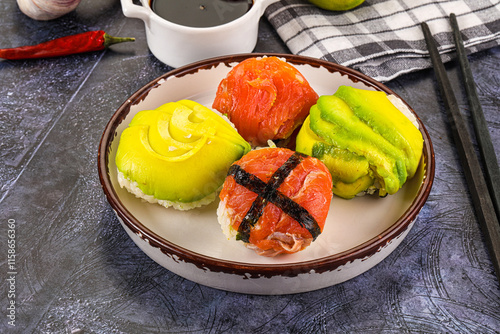 Round tamari sushi with salmon and avocado photo