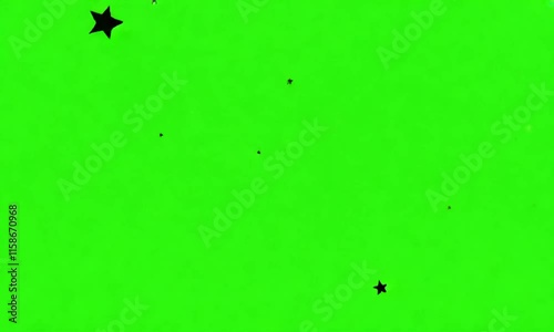 Spinning Black Silhouette Stars on a Green Background
 photo