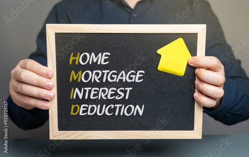 Home mortgage interest deduction concept. Tax benefit that allows homeowners to deduct interest paid on a qualified mortgage for a primary or secondary residence from their taxable income.