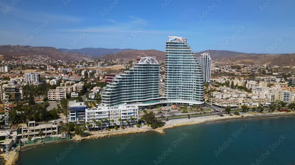 Aerial view of Limassol on a clear day. Majestic view of the most beautiful creation of man. Over Limassol, Cyprus. Aerial view of the modern cityscape of Limassol with high-rise glass structures. Aerial view of Limassol on a clear day. Majestic view of the most beautiful creation of man. Over Limassol, Cyprus. Aerial view of the modern cityscape of Limassol with high-rise glass structures.