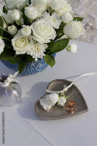 wedding rings and bouquet