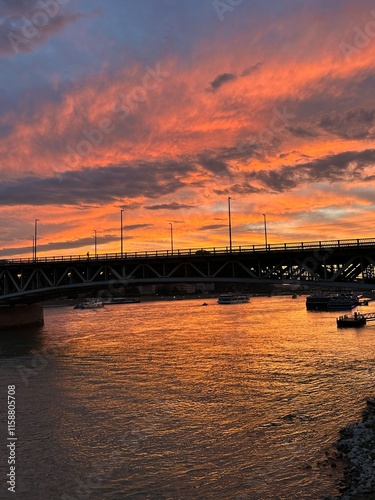 Sunset in the city with river and bridge 
