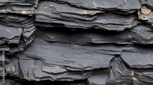 Dark Slate Rock Layers, Natural Stone Texture, Rough Surface Pattern, Geological Formation, Nature Inspired Design photo