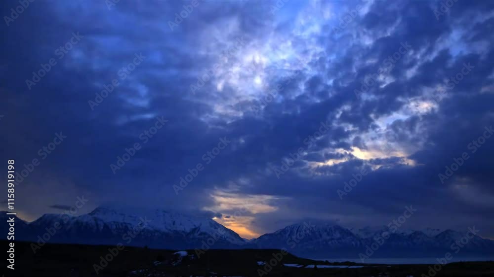 time lapse of clouds over the mountains