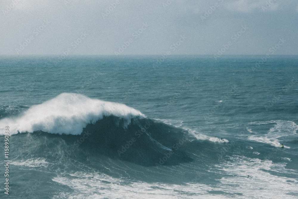 Surfer Riding a 20-Meter Giant Wave at Nazaré Surfer Riding a 20-Meter Giant Wave at Nazaré
