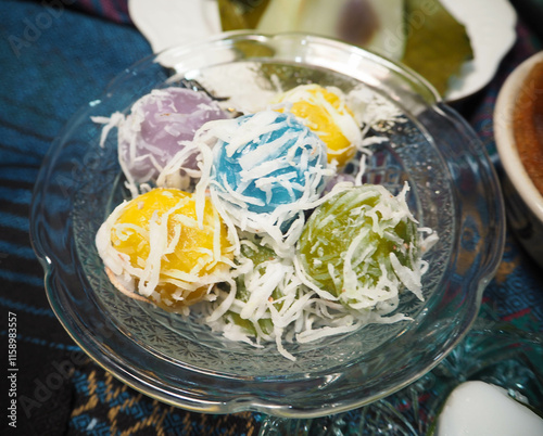 Thai Coconut Rice Ball Dessert on Vibrant Fabric 
Fluffy cupcakes 1