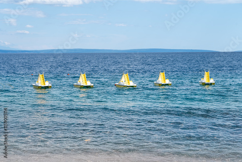 pedal boats with slide on the sea