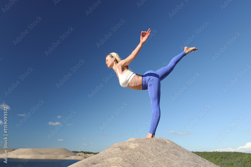 Young sporty woman practicing yoga Young sporty woman practicing yoga