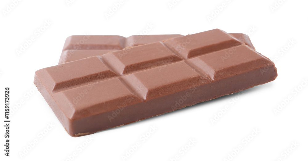 Pieces of delicious milk chocolate isolated on white Pieces of delicious milk chocolate isolated on white