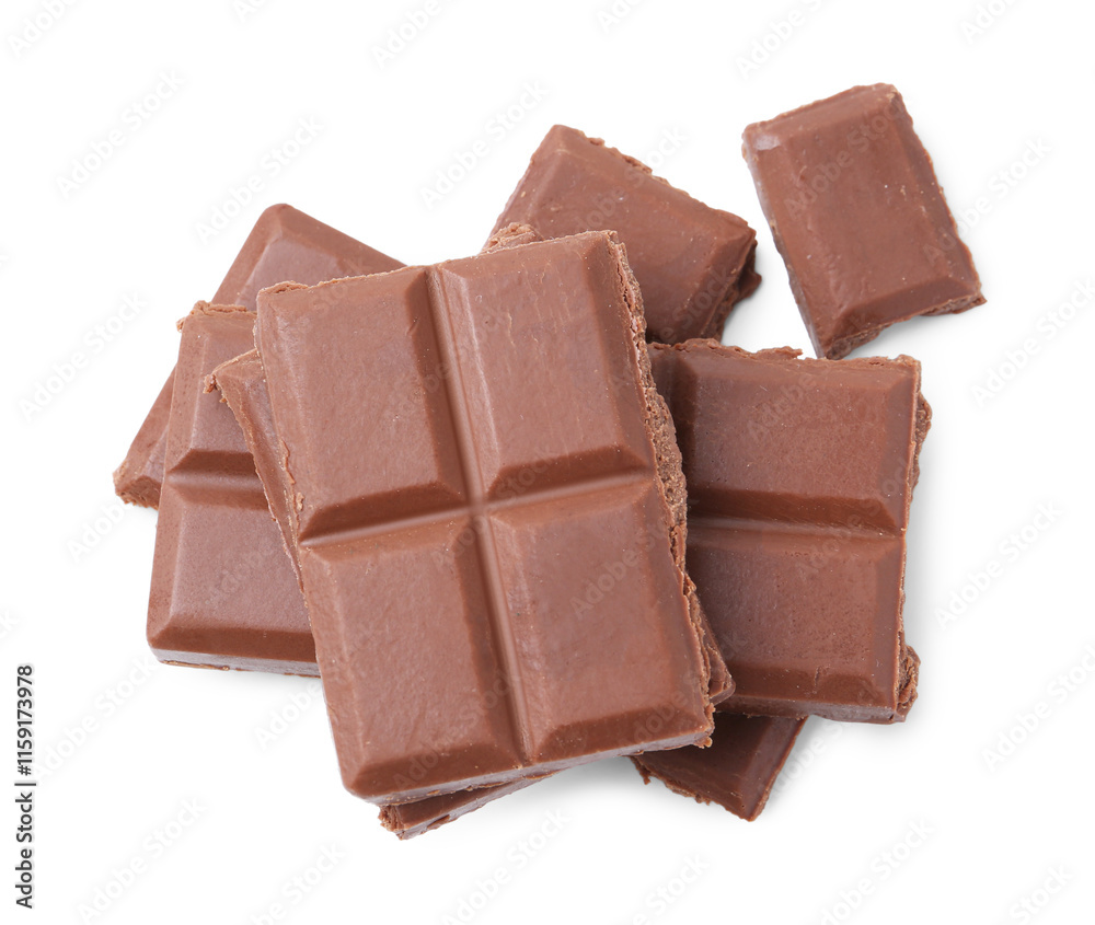 Pieces of delicious milk chocolate isolated on white, top view Pieces of delicious milk chocolate isolated on white, top view
