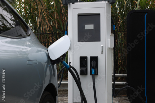 Electric Vehicle EV Charging Station Green Energy. public electric vehicle Charging point stationed image