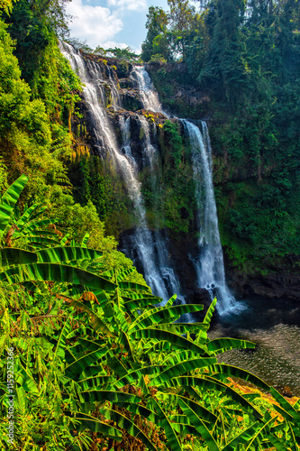 waterfall Tad Fane  in rainforest at Pakse and Champasak city Laos. Tour tourism and travel in Asia. Beautiful and largest park with cascades of waterfalls in Laos photo