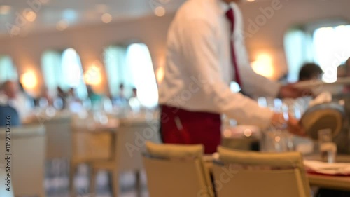 Blurred scene in restaurant, dinner time