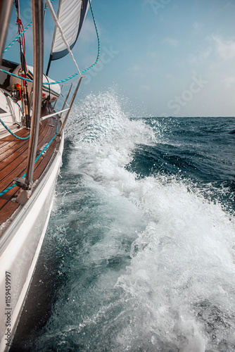 Sailing on a sailboat among big waves