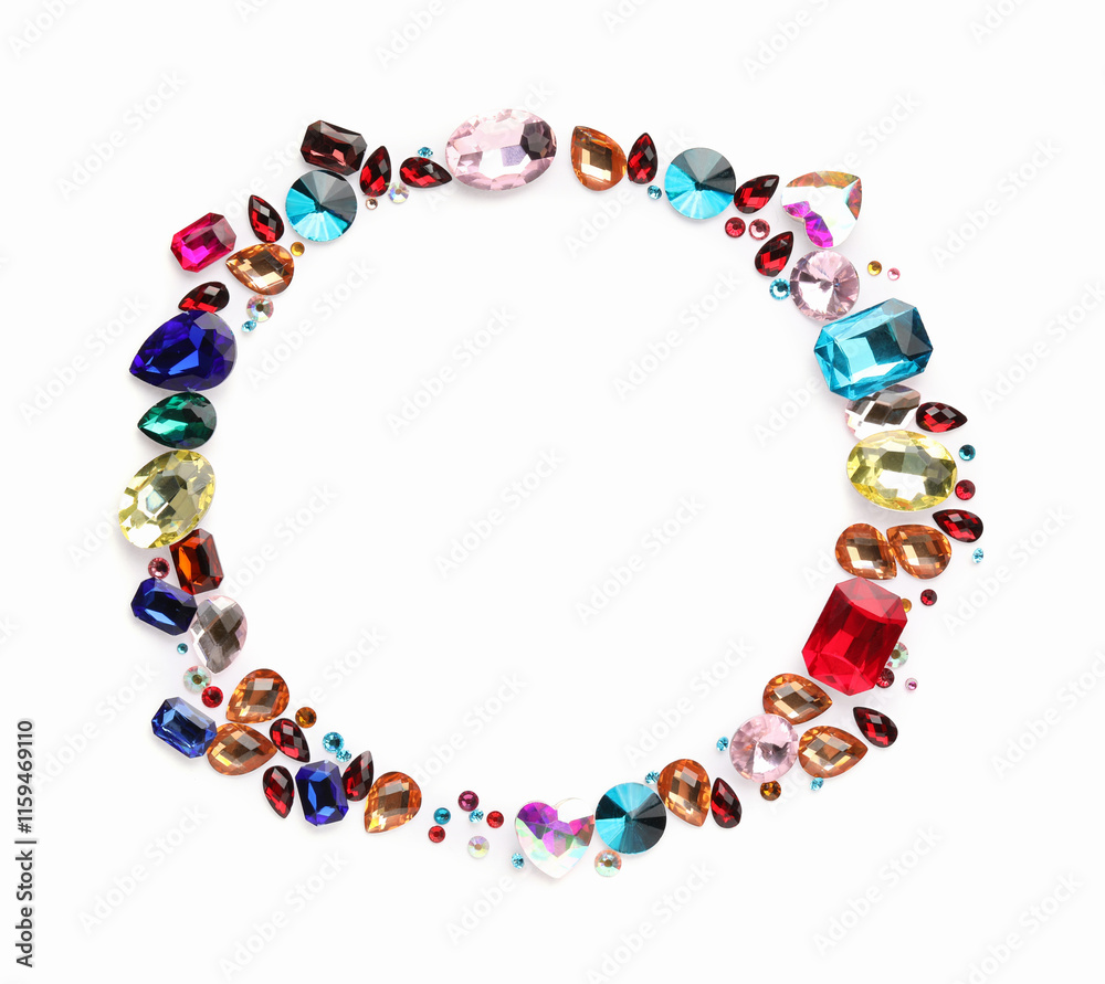 Frame of different shiny gemstones on white background, flat lay. Space for text Frame of different shiny gemstones on white background, flat lay. Space for text