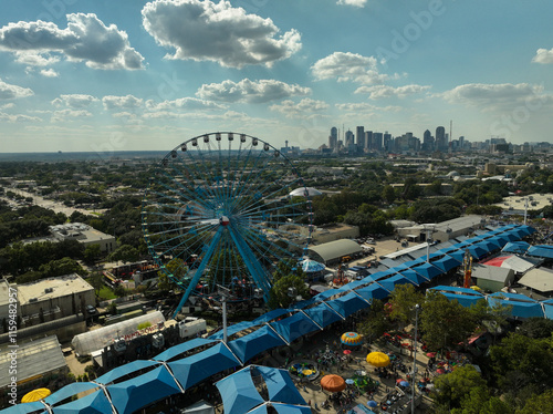 Aerial view of the Texas State Fair Ferris Wheel and the Dallas, Texas skyline