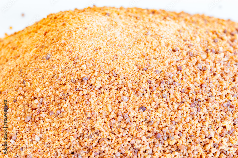 Macro photo of Coconut sugar. Detail of coco sugar also known as coconut palm sugar or coco sap sugar.